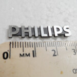 Genuine original Philips separates plastic badge logo 2 small pins intact | p/n 8222 459 10803